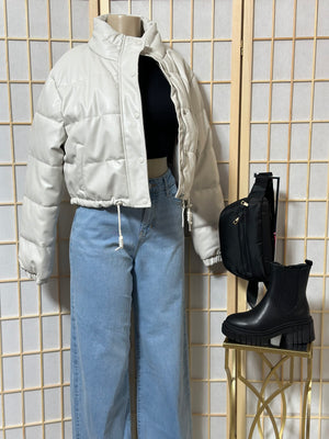 The “On The Move” Faux Leather Puffer Jacket In Ivory