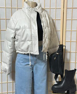 The “On The Move” Faux Leather Puffer Jacket In Ivory