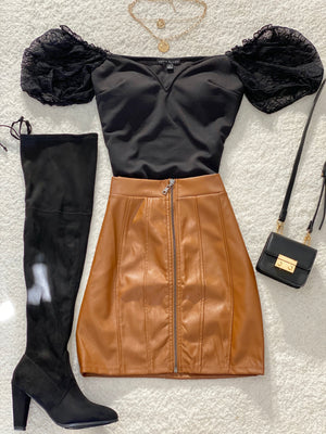 The “Tina” Faux Leather Skirt In Brown