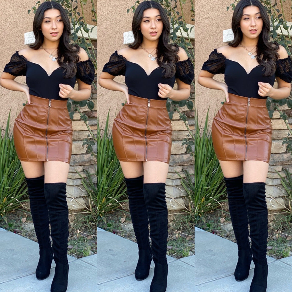 The “Tina” Faux Leather Skirt In Brown