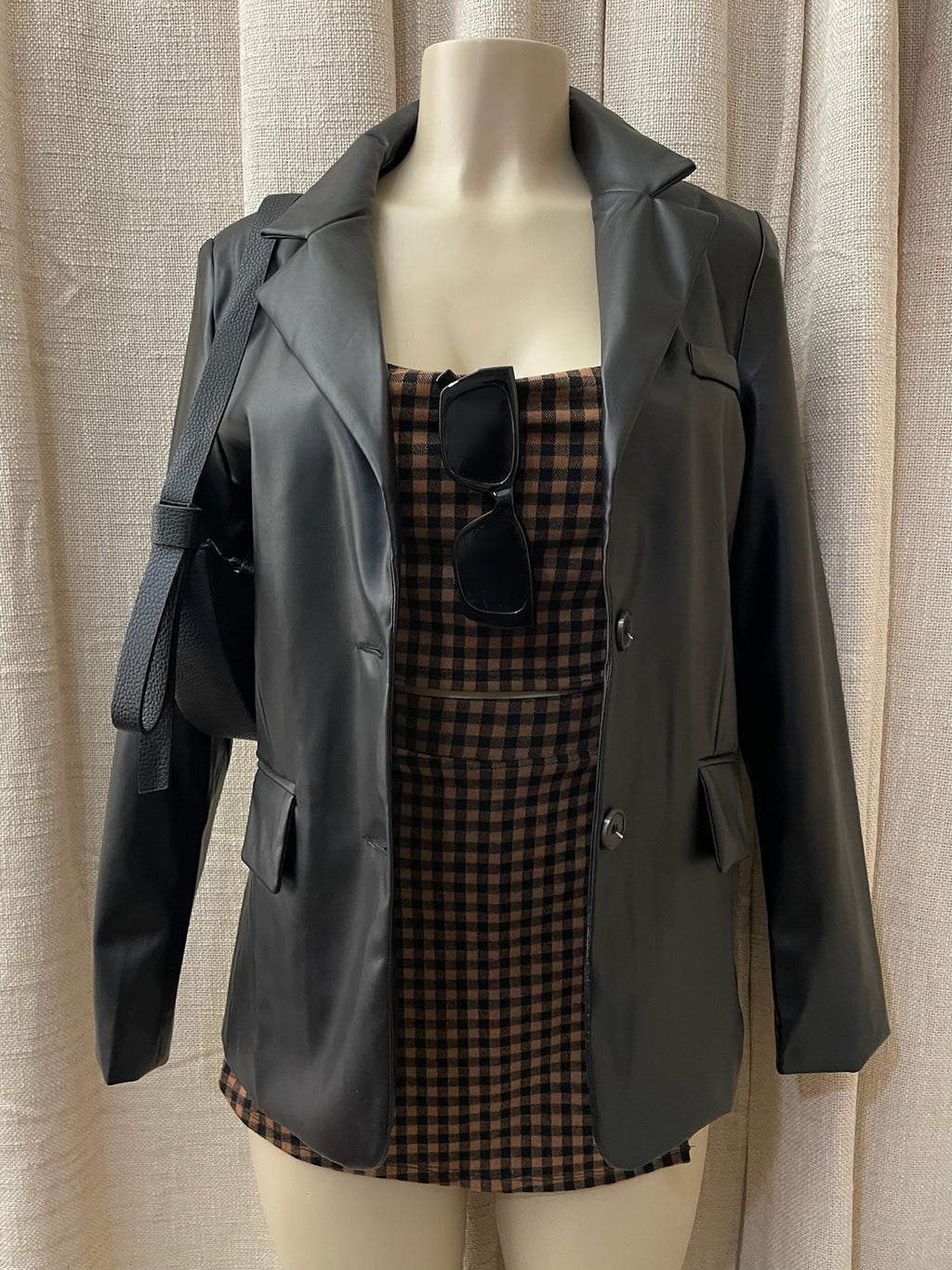 The “Booked & Busy” Faux Leather Jackey