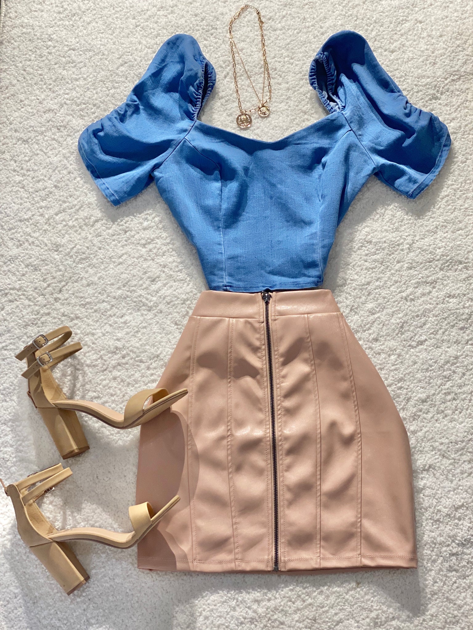 The “Tina” Faux Leather Skirt In Blush
