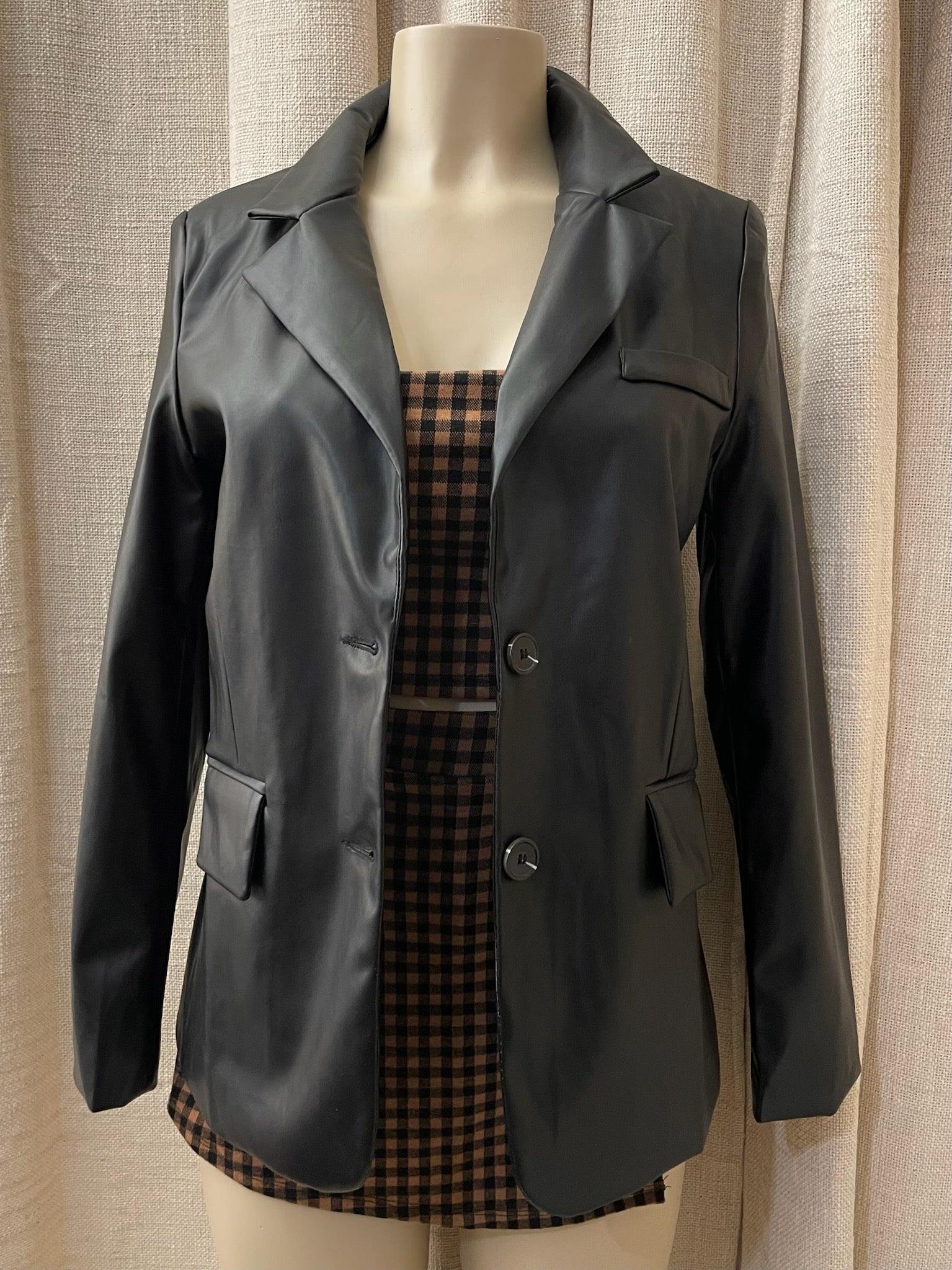 The “Booked & Busy” Faux Leather Jackey